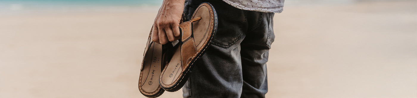 Shop men's sandals for summer comfort & support. Featuring Orca Bay leather sandals, flip flops & Birkenstock-style sandals