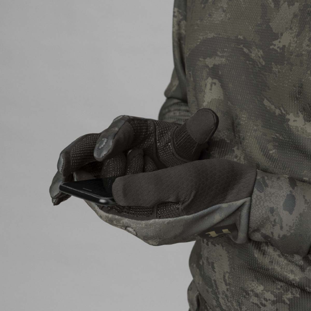 Härkila NOCTYX Camo Fleece Glove w/foldback Finger - phone Härkila NOCTYX Camo Fleece Glove w/foldback Finger - phone