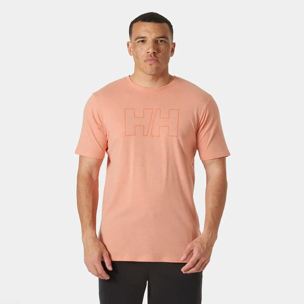 Helly Hansen HH Tech Logo T-Shirt- Bonfire on model Helly Hansen HH Tech Logo T-Shirt- Bonfire on model