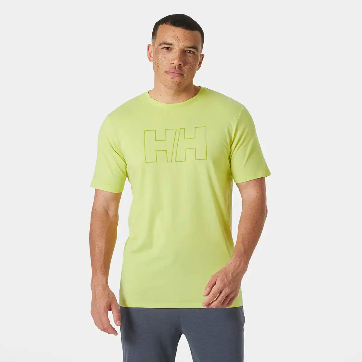 Helly Hansen HH Tech Logo T-Shirt- Cyber Lime on model Helly Hansen HH Tech Logo T-Shirt- Cyber Lime on model