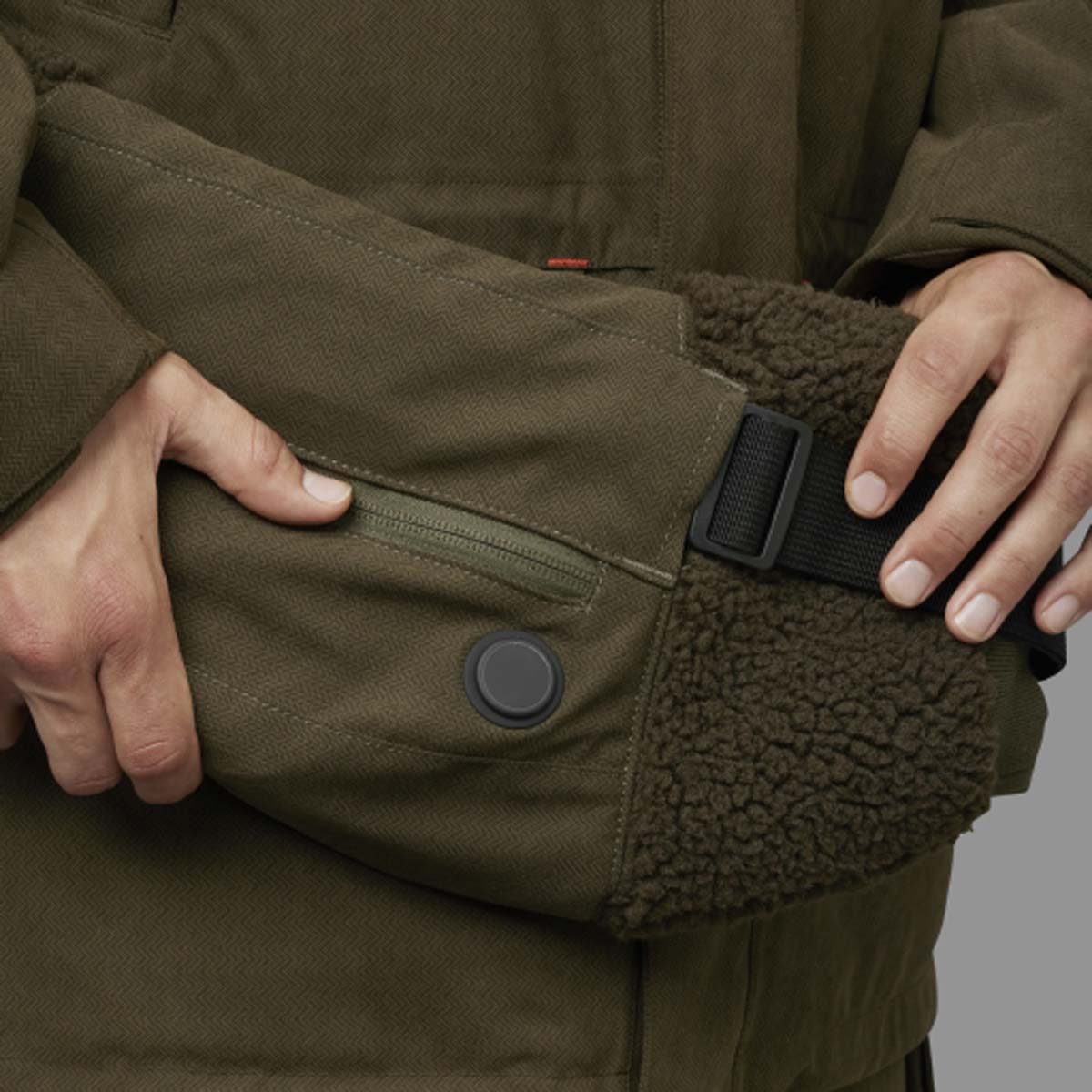 Harkila Driven Hunt Heat Muff - Heat Button Harkila Driven Hunt Heat Muff - Heat Button