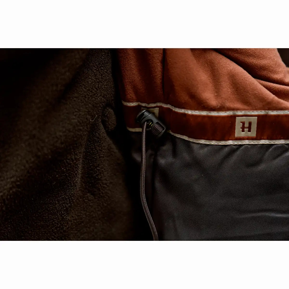 Harkila Driven Hunt Women's HWS Insulated Jacket - Worn By Model - Inner Adjustment Toggle Harkila Driven Hunt Women's HWS Insulated Jacket - Worn By Model - Inner Adjustment Toggle