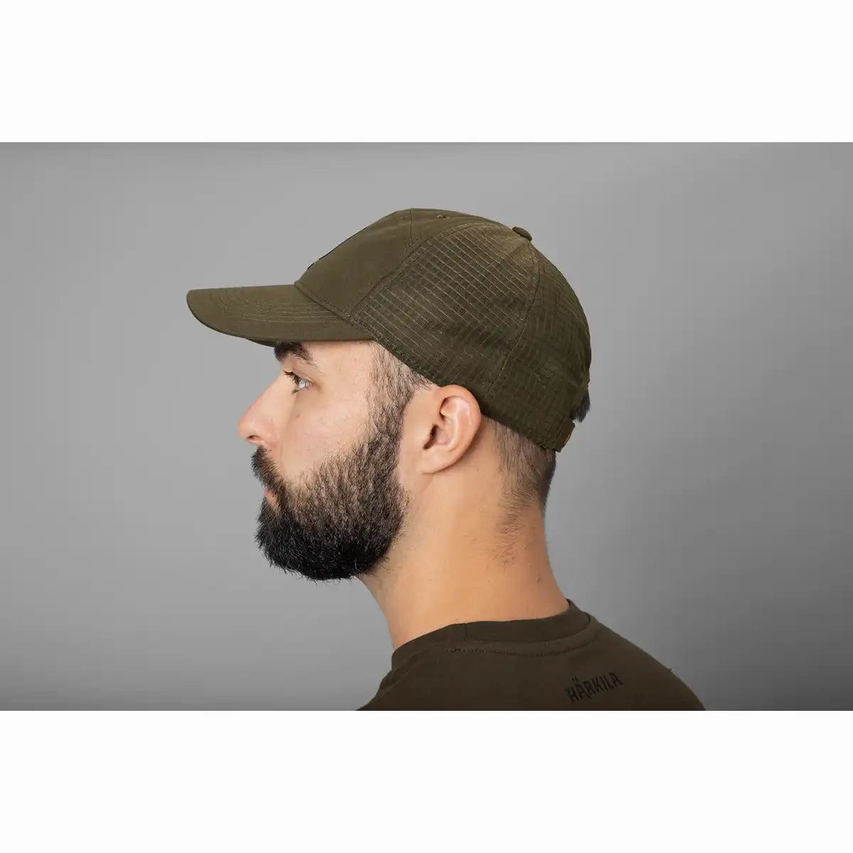 Harkila Instinct Cap - Willow Green - Worn By Model - Side Harkila Instinct Cap - Willow Green - Worn By Model - Side