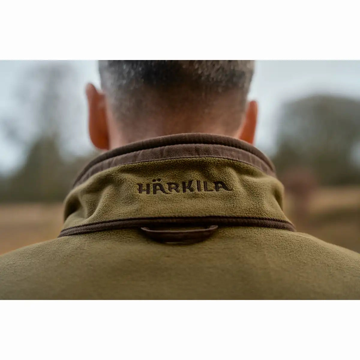Harkila Kamko Estate WSP Reversible Waistcoat - Dark Olive - Collar Logo Harkila Kamko Estate WSP Reversible Waistcoat - Dark Olive - Collar Logo