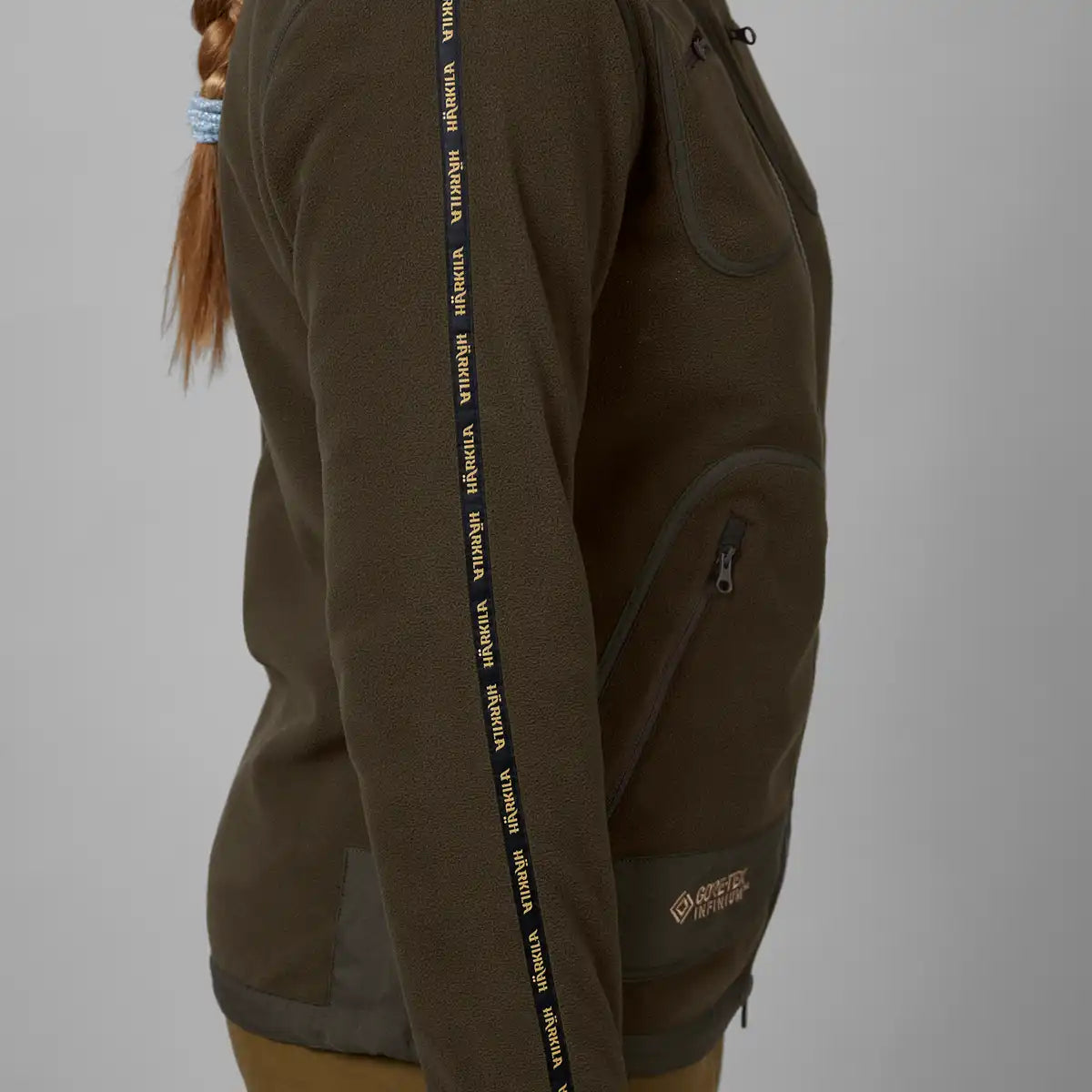 Harkila Kamko Women's Fleece Jacket - Brown - Worn By Model - Side Harkila Kamko Women's Fleece Jacket - Brown - Worn By Model - Side