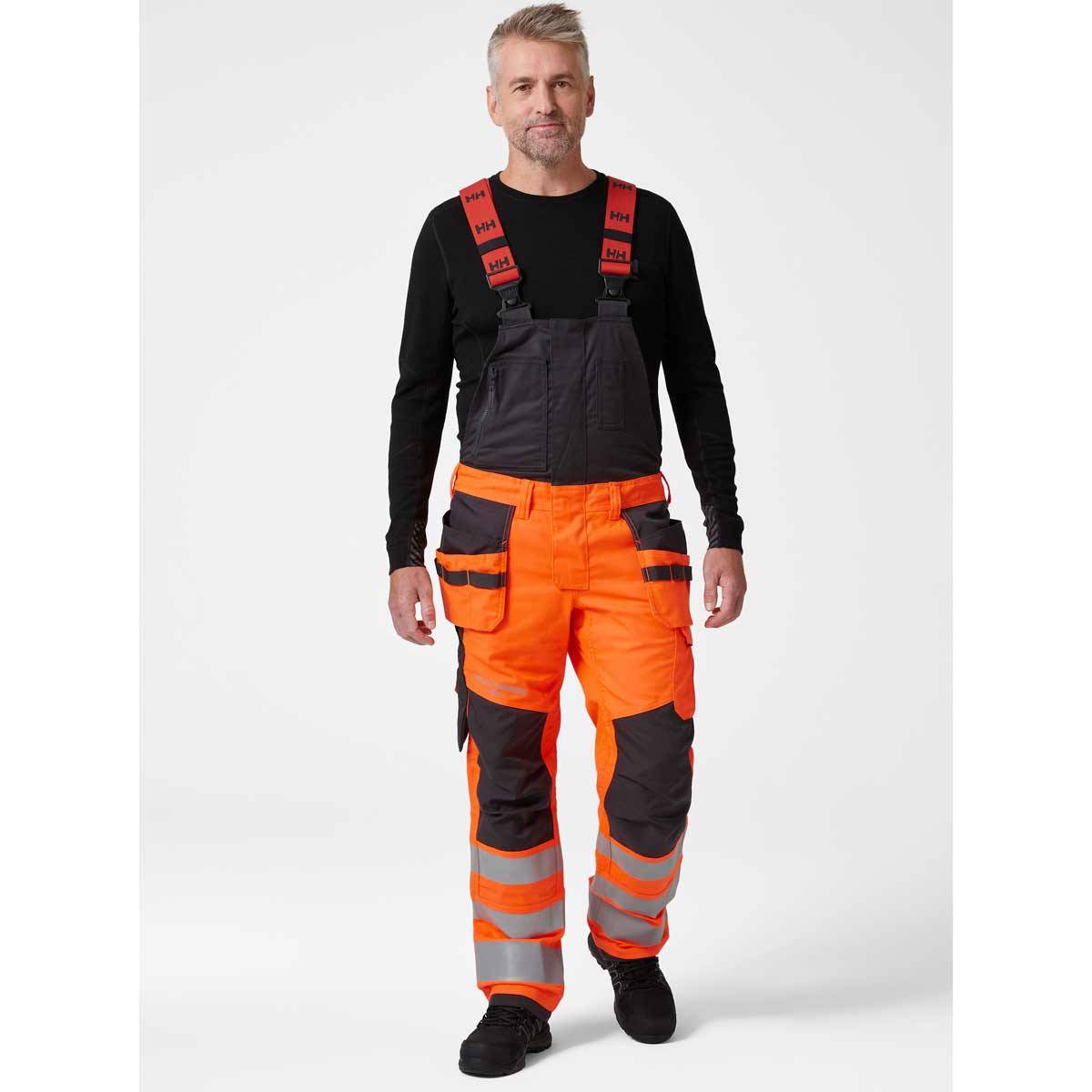Helly Hansen Alna 2.0 Hi Vis Construction Bib Orange Front view Helly Hansen Alna 2.0 Hi Vis Construction Bib Orange Front view