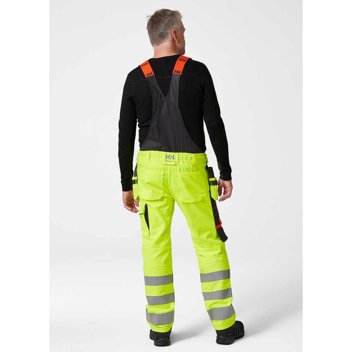 Helly-Hansen-Alna-2.0-Hi-Vis-Construction-Bib-Yellow-Onbody-Rear Helly-Hansen-Alna-2.0-Hi-Vis-Construction-Bib-Yellow-Onbody-Rear