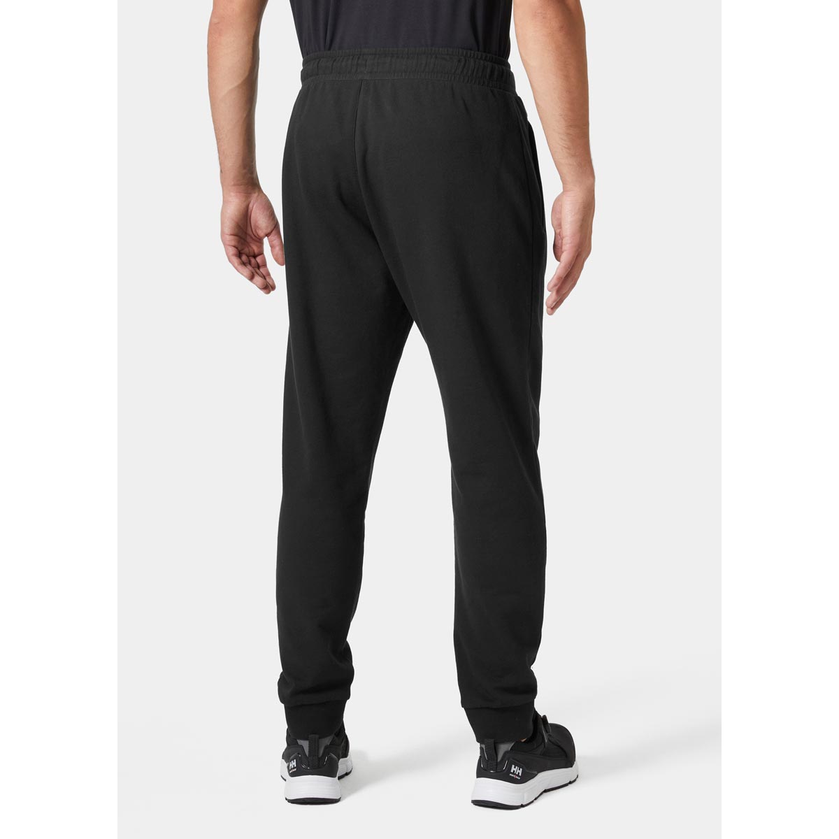 Helly Hansen Essential Sweatpants - Black On Model Rear Helly Hansen Essential Sweatpants - Black On Model Rear