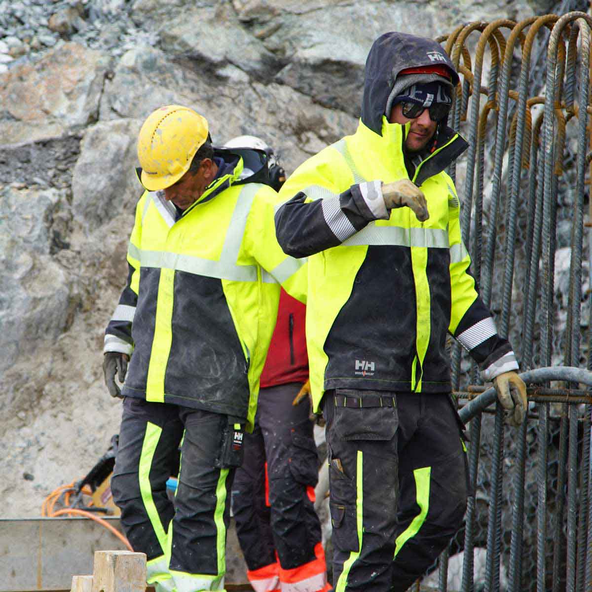 Helly Hansen ICU Hi Vis 3 Layer Waterproof Shell Jacket - lifestyle Helly Hansen ICU Hi Vis 3 Layer Waterproof Shell Jacket - lifestyle