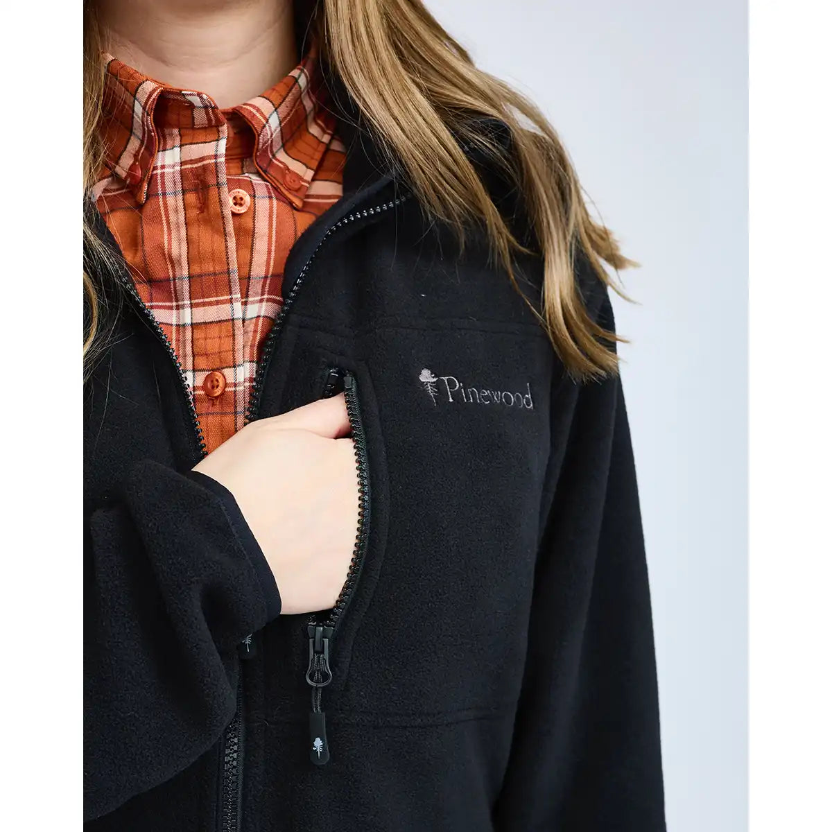 Pinewood Finnveden Women's Fleece Jacket - Black - Worn By Model - Pocket Close Up Pinewood Finnveden Women's Fleece Jacket - Black - Worn By Model - Pocket Close Up