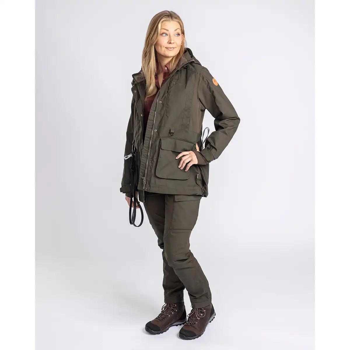 Pinewood Dog Sports Womens Trainer Trousers- Moss Green- on model with matching jacket Pinewood Dog Sports Womens Trainer Trousers- Moss Green- on model with matching jacket