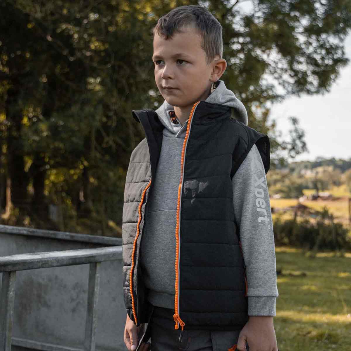 Xpert Pro Junior Rip-Stop Panelled Bodywarmer On MOdel Xpert Pro Junior Rip-Stop Panelled Bodywarmer On MOdel