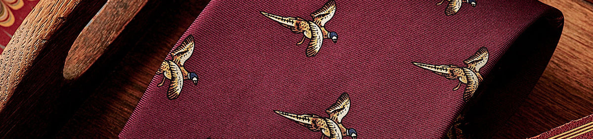 Silk shooting ties with sporting motifs Silk shooting ties with sporting motifs