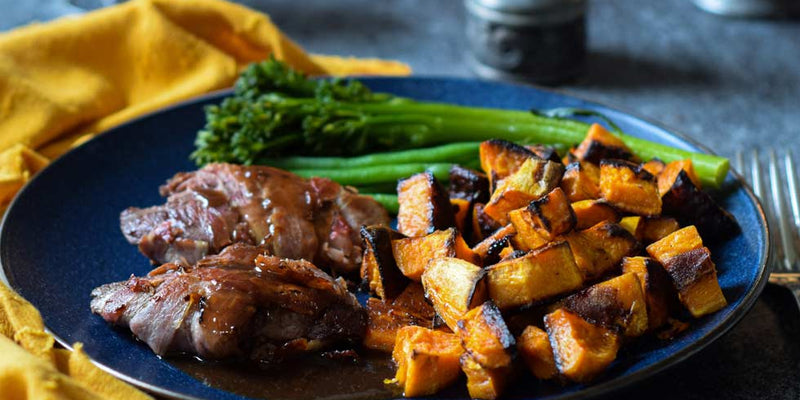 Pan-fried grouse with roasted sweet potatoes, pancetta and sticky sherry-soy sauce